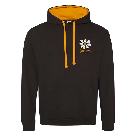 Black hoodie with yellow drawstrings and a white flower logo on a white background