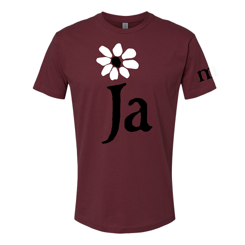 Maroon t-shirt with a white flower and black 'Ja' text on a white background