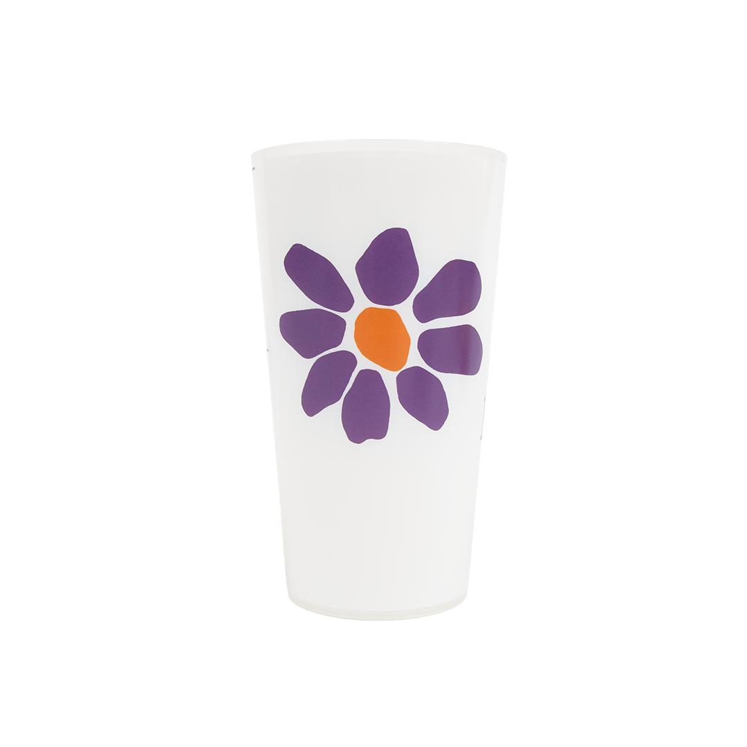 White tumbler with a purple flower design on a white background